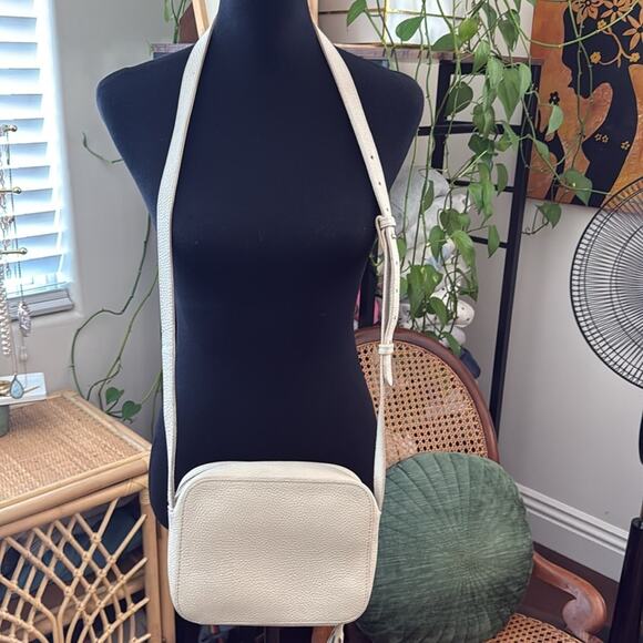 Cuyana Cream Pebbled Leather Tassel Zip Crossbody Camera Bag - Picture 2 of 7